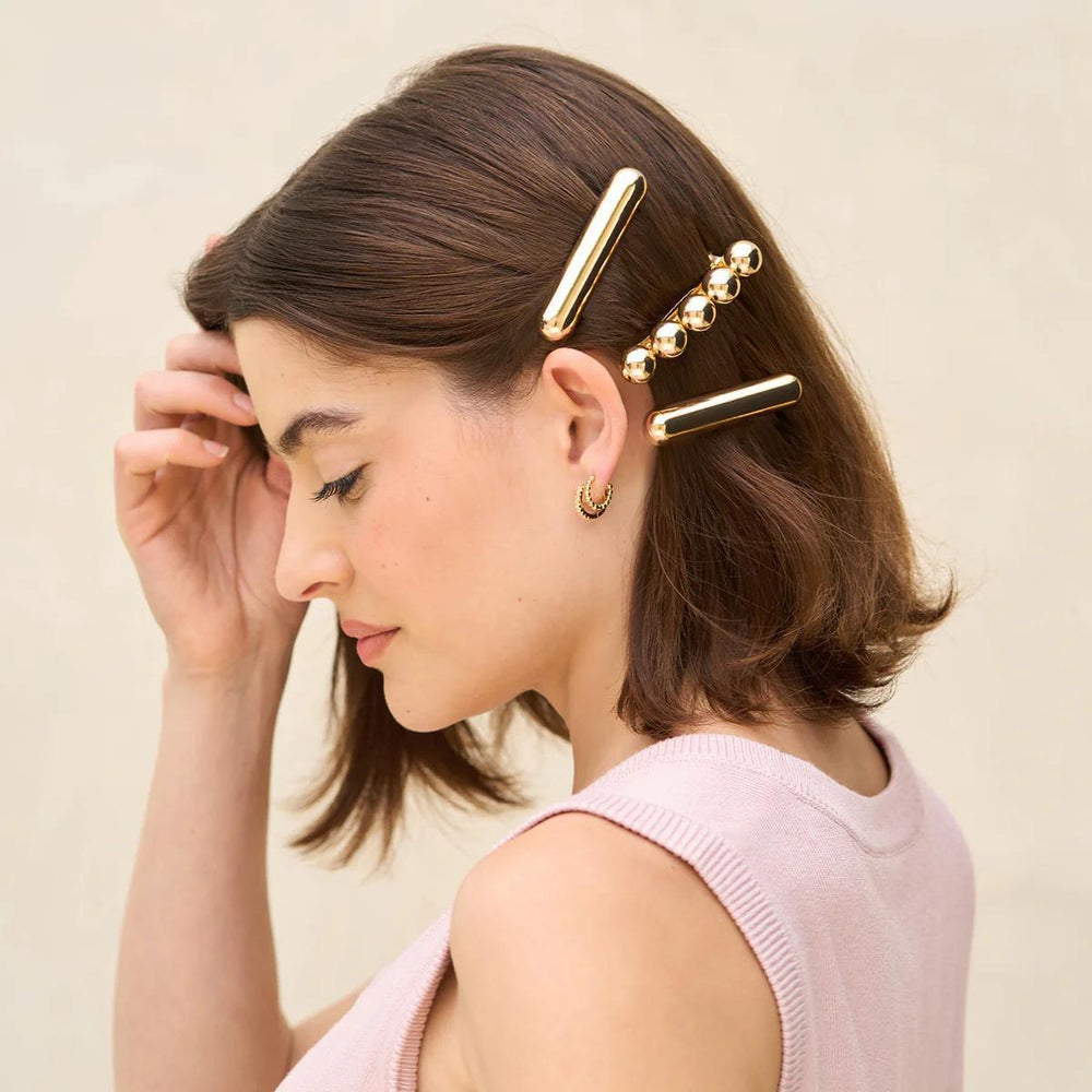 
                      
                        Kitsch Gold Metal Barrettes 金色金属发夹
                      
                    